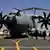 People looking at the new military Airbus A400M after its presentation in Seville, Spain.