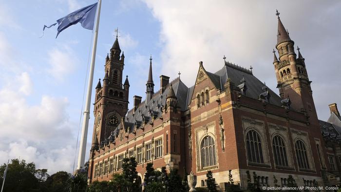 UN flag flutters in wind next to ICJ in The Hague, the Netherlands