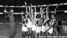Jubilant Indian players show their feelings after defeating Korea 2-1 to win the gold medal in the soccer competition at the Asian Games in Jakarta on Sept. 4, 1962. (AP Photo) |