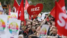 CHEMNITZ, GERMANY - SEPTEMBER 01: People take part in a gathering under the motto: Heart Instead Of Baiting (Herz Statt Hetze) to counter a right-wing gathering that was to take place nearby on September 1, 2018 in Chemnitz, Germany. Two refugees, a Syrian and an Iraqi, are accused of having stabbed local resident Daniel Hillig following an altercation in the early hours of August 26. The death has sparked angry protests by locals as well as right-wing groups that have led to clashes with police and counter-protesters. (Photo by Sean Gallup/Getty Images)