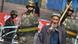 Troops watch a Uighur man in Urumqi, the capital of Xinjiang province Troops watch a Uighur man in Urumqi, the capital of Xinjiang province