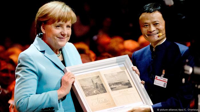 图为马云2015年3月在汉诺威CeBIT上与默克尔见面
