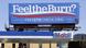 Billboard above a gas station that reads "Feel The Burn" promoting testing for sexually transmitted diseases Billboard above a gas station that reads "Feel The Burn" promoting testing for sexually transmitted diseases