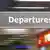 A "departure" sign at the airport 
