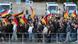 Demonstrators holding up German flags march through Chemnitz on Friday Demonstrators holding up German flags march through Chemnitz on Friday