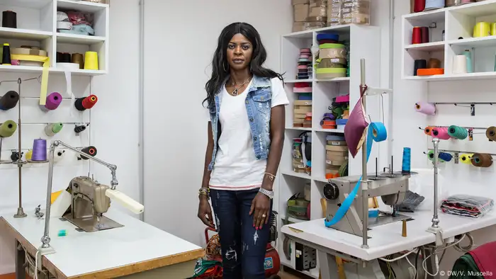 B. poses for a portrait in a tailor's workshop in Castel Volturno, Italy (DW/V. Muscella)