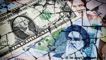 Iranischer Rial und US-Dollar auf gebrochenem Grund, iranische Währungskrise *** Iranian rial and US dollar on cracked ground Iranian currency crisis 