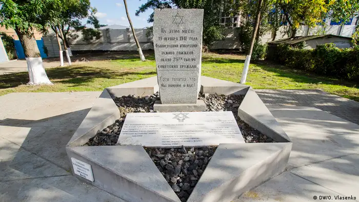 A memorial stone sits in a Star of David recalling the murdered Jews of the Odessa Massacre