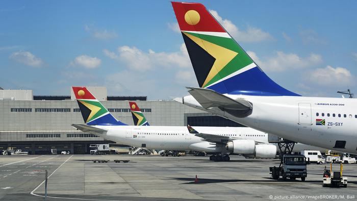 Two South African Airways airbuses on the tarmac at Tambo International Airport