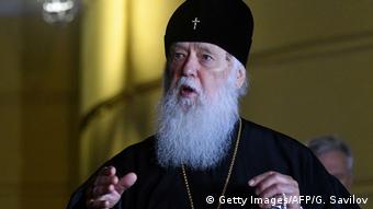 Patriarch Filaret in robes, gesturing with his hands 