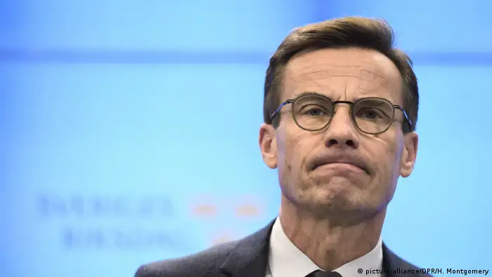 Close-up of Ulf Kristersson, leader of Sweden's Moderate Party, who frowns at a press conference after his meeting with the speaker of the parliament in Stockholm,