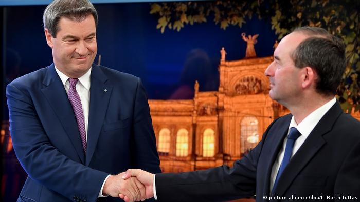 Член ХСС Маркус Зедер (л) та лідер Вільних виборців Губерт Айванґер