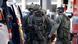 Police teams deal respond to a hostage situation at Cologne's main train station Police teams deal respond to a hostage situation at Cologne's main train station