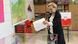 A woman casts her ballot in a local election in Gdansk, Poland A woman casts her ballot in a local election in Gdansk, Poland