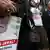 Protesters in Washington holding pictures of Khashoggi