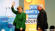 Hesse State Prime Minister Volker Bouffier and German Chancellor Angela Merkel attend the final campaign rally prior to the upcoming state election, in Fulda, Germany, October 25, 2018. REUTERS/Ralph Orlowski