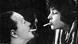 Scene from Seine Frau, die Unbekannte shows a couple smoking Scene from Seine Frau, die Unbekannte shows a couple smoking