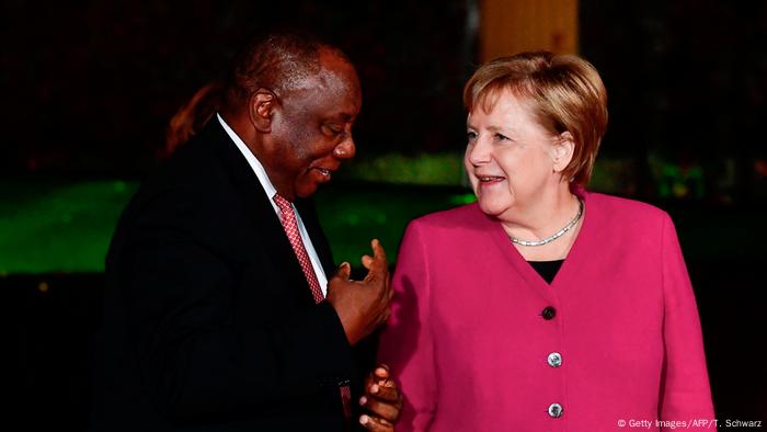 German Chancellor Angela Merkel talks to South African President Cyril Ramaphosa.