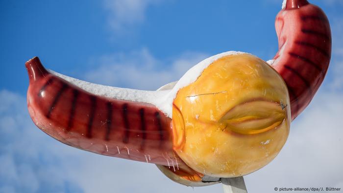 Image of grilled sausage over a kiosk in Lubeck