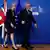 Британский премьер Тереза Мэй и глава Еврокомиссии Жан-Клод Юнкер