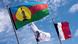 The Kanak and French flags fly in New Caledonia The Kanak and French flags fly in New Caledonia