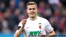 AUGSBURG, GERMANY - NOVEMBER 03: Alfred Finnbogason of Augsburg celebrates after scoring his team's first goal during the Bundesliga match between FC Augsburg and 1. FC Nuernberg at WWK-Arena on November 3, 2018 in Augsburg, Germany. (Photo by Alex Grimm/Bongarts/Getty Images)