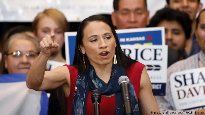 Sharice Davids, from Kansas, is the first Native American woman to be elected to the US Congress. She identifies as a lesbian, and is therefore also the first LGBT member of Congress from Kansas. A former mixed martial arts fighter, she is a member of the Ho-Chunk Nation, a Native American tribe in Wisconsin.