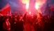 Protesters light flares and carry Polish flags during a rally, organised by far-right, nationalist groups, to mark 99th anniversary of Polish independence in Warsaw, Poland November 11, 2017 Protesters light flares and carry Polish flags during a rally, organised by far-right, nationalist groups, to mark 99th anniversary of Polish independence in Warsaw, Poland November 11, 2017