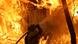 A firefighter battles the "Camp Fire" blaze near Magalia, California A firefighter battles the "Camp Fire" blaze near Magalia, California
