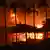 A house burns during the Woolsey Fre on November 9, 2018, in Malibu, California