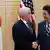 Mike Pence shaking hands with Shinzo Abe