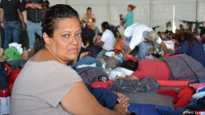 Maribel Ponce Hernandez sits in a tent set up for the migrant caravan in Mexiko City