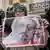 Woman holding placard with Jamal Khashoggi and 'Justice for Jamal' written on it