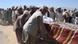 Local Afghani people bury their villagers killed in a NATO air strike, in a mass grave near Kunduz, Afghanistan Local Afghani people bury their villagers killed in a NATO air strike, in a mass grave near Kunduz, Afghanistan