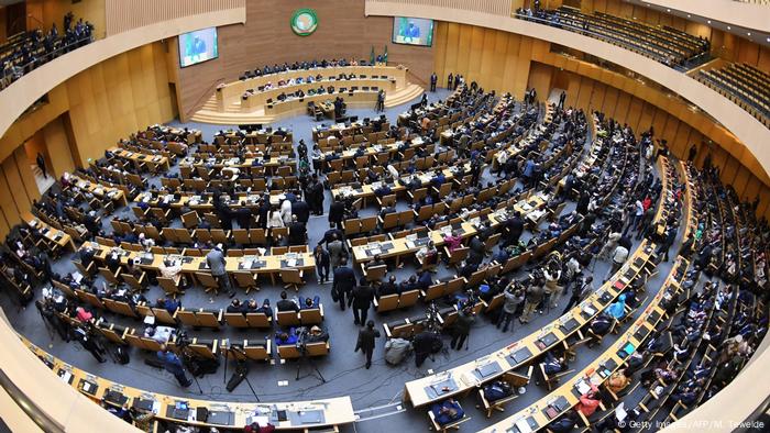 A birds-eye view of delegates sitting in the African Union building 