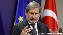 The European Union's Enlargement Commissioner Johannes Hahn speaks during a joint news conference with Turkish Foreign Minister Mevlut Cavusoglu and EU's foreign policy chief Federica Mogherini after their meeting, in Ankara, Turkey, Thursday, Nov. 22, 2018. Mogherini on Thursday expressed strong concerns over the continued detentions of academics and activists in Turkey. Federica Mogherini also called for the release of Turkey's former pro-Kurdish party leader Selahattin Demirtas from jail, in line with a European Court of Human Rights ruling this week. (AP Photo/Burhan Ozbilici) |