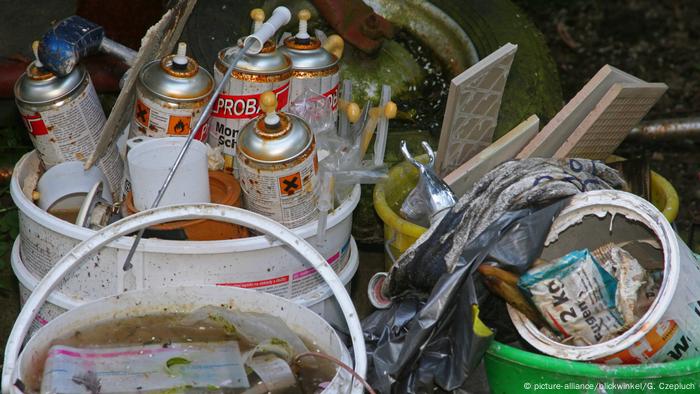 Illegally dumped spray cans and paint in Germany