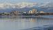 The city of Anchorage with mountains in the background The city of Anchorage with mountains in the background