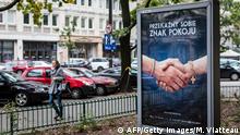 A poster, part of a social campaign for tolerance of homosexual minority in Catholic church in Poland, is seen on the sreet of Warsaw on September 28, 2016. / AFP / WOJTEK RADWANSKI (Photo credit should read WOJTEK RADWANSKI/AFP/Getty Images)