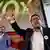 Spain's far-right VOX party regional candidate Francisco Serrano delivers a speech next to leader Santiago Abascal as they celebrate results after the Andalusian regional elections in Seville, Spain