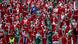 Santa Clauses and green elves on the streets of Madrid Santa Clauses and green elves on the streets of Madrid