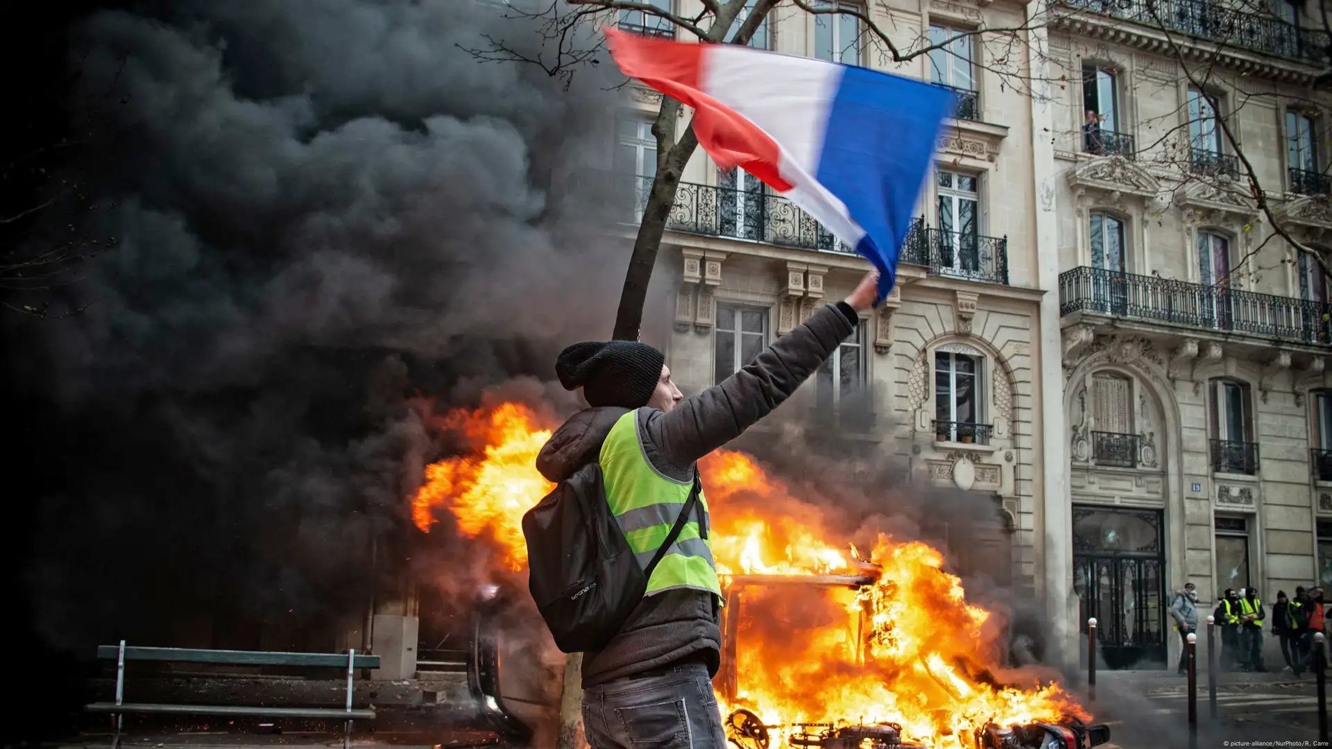 STRASBOURG, FRANCE - FEB 02, 2018: Rear view of adult woman with Louis  Vuitton backpack during protest of Gilets Jaunes Yellow Vest manifestation  anti-government demonstrations on Boulevard de Dresde Stock Photo - Alamy