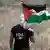 Gaza: Palestinian with flag