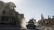 An armored vehicle drives through the city of Raqqa, Syria, after the Kurdish-led SDF drove out the 'Islamic State' militant group from its de facto capital An armored vehicle drives through the city of Raqqa, Syria, after the Kurdish-led SDF drove out the 'Islamic State' militant group from its de facto capital