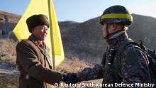 Soldiers from North and South Korea verify the removal of guard posts on each side of the Demilitarized Zone, December 12, 2018. South Korean Defence Ministry/Handout via REUTERS THIS IMAGE HAS BEEN SUPPLIED BY A THIRD PARTY.