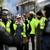 Yellow vest protesters and riot police in Paris