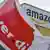 A Verdi union flag flies outside of an Amazon building in Germany