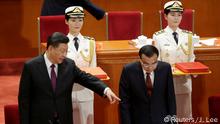 Chinese President Xi Jinping and Premier Li Keqiang attend an event marking the 40th anniversary of China's reform and opening up at the Great Hall of the People in Beijing, China December 18, 2018. REUTERS/Jason Lee