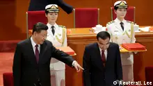 Chinese President Xi Jinping and Premier Li Keqiang attend an event marking the 40th anniversary of China's reform and opening up at the Great Hall of the People in Beijing, China December 18, 2018. REUTERS/Jason Lee