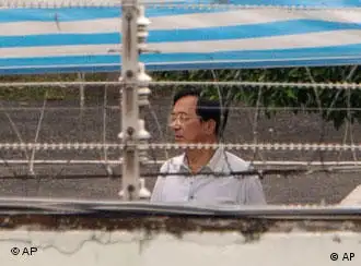 Taiwan former President Chen Shui-bian is seen behind barbed-wire at the Tucheng Detention Center in Taipei County, Taiwan, Friday, Sept. 11, 2009. In a sign of protest Chen refused to be in court Friday when his verdict was to be announced in his high-profile corruption trial. (AP Photo) ** TAIWAN OUT **